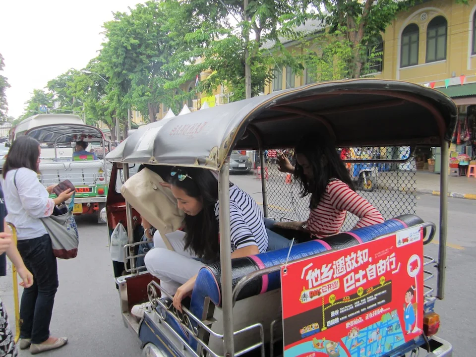 Tourists in a Tuk Tuk in Bangkok